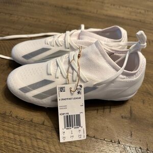 Youth Adidas Messi shin guards and cleats